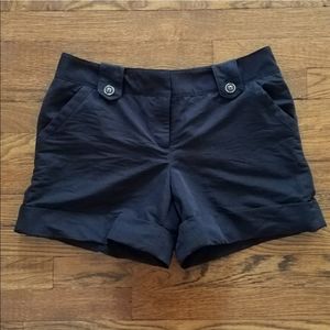WHBM black cuffed shorts button detail size 6